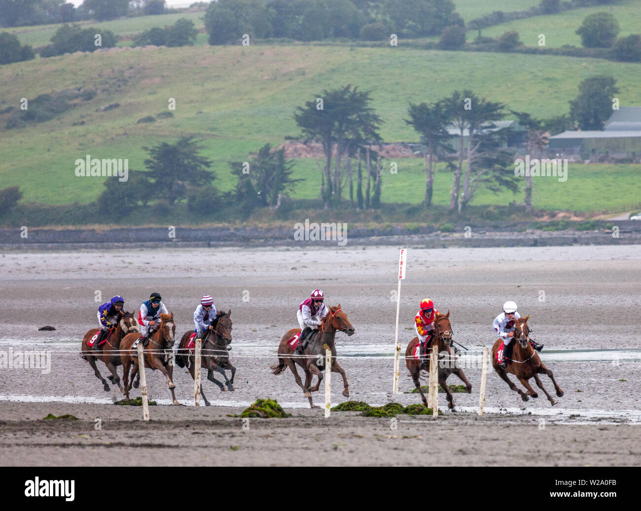 Courtmacsherry, Cork, Ireland. 07th July, 2019. Taking the bend at the annual Strand Races that was held in Courtmacsherry, Co. Cork, Ireland. Credit: David Creedon/Alamy Live News Stock Photo