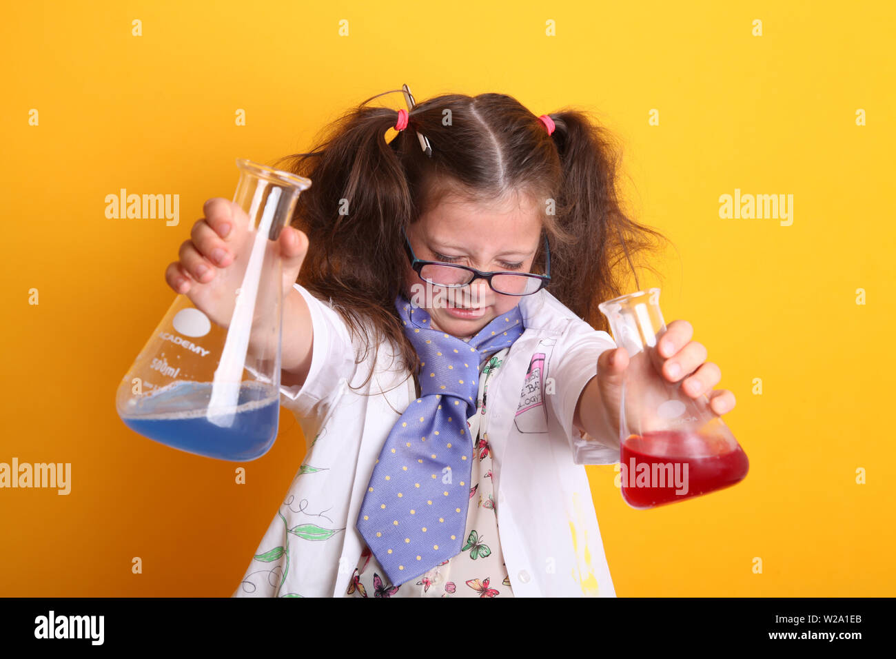 MR Science Experiment at Home Geek Child Age 7 holding borosilicate