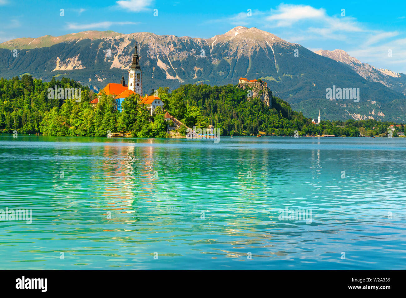 Wonderful travel and touristic place. Famous and spectacular lake Bled with picturesque Pilgrimage church on small island, Bled, Slovenia, Europe Stock Photo