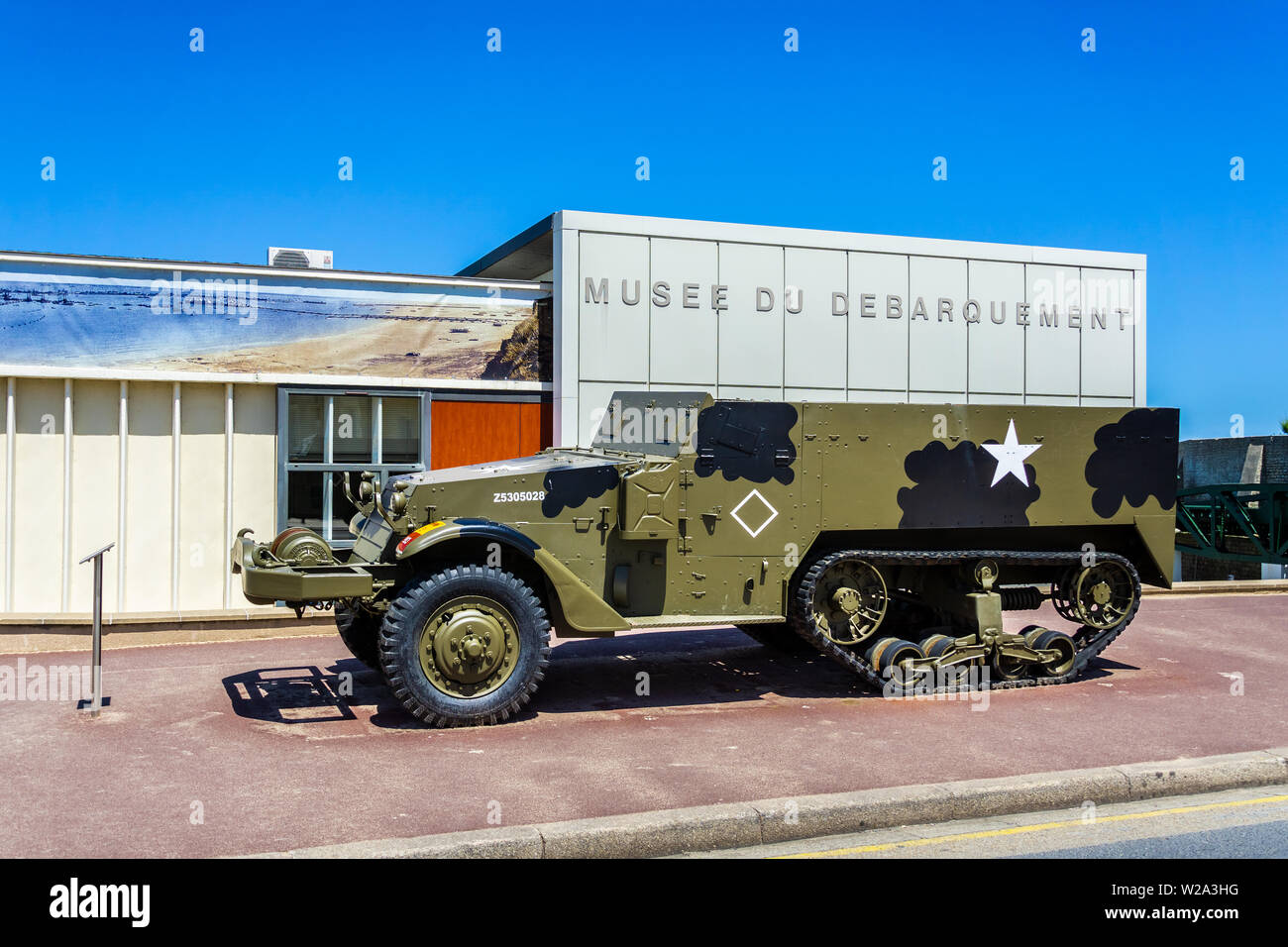 US M3 Half track personnel carrier along the World War Two D-Day museum of Arromanches-les-Bains, Normandy, France. Stock Photo