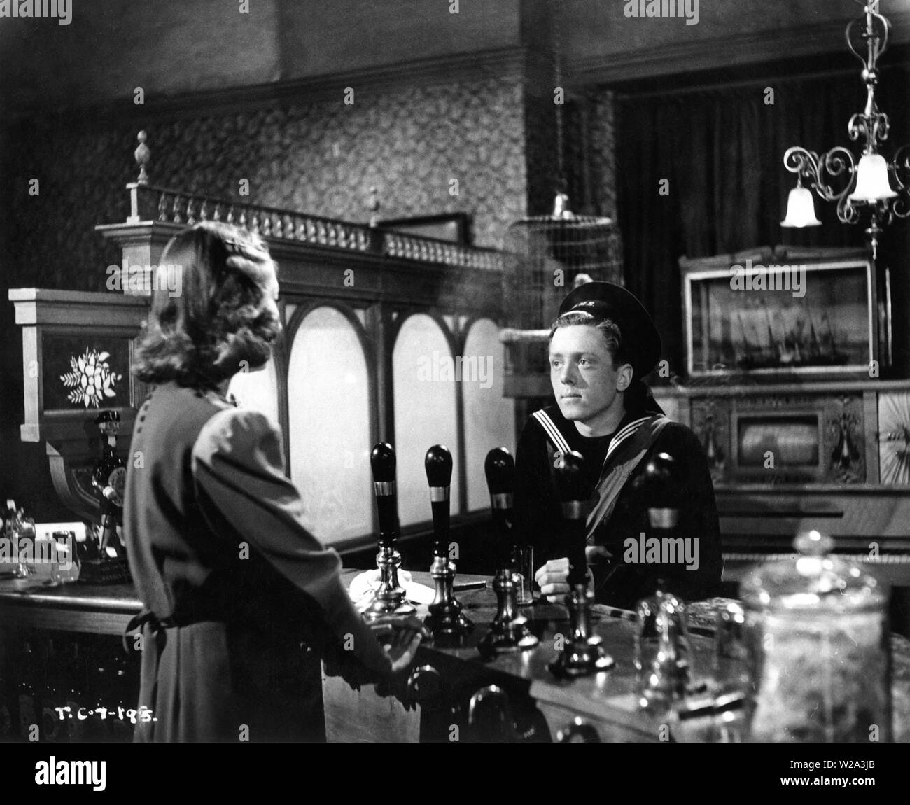 Richard Attenborough and Kay Young in IN WHICH WE SERVE 1942 directors Noel Coward and David Lean writer Noel Coward photographed by Ronald Neame producers Two Cities Films / The London Symphony Orchestra (LSO) / British Lion Film Corporation Ltd Stock Photo