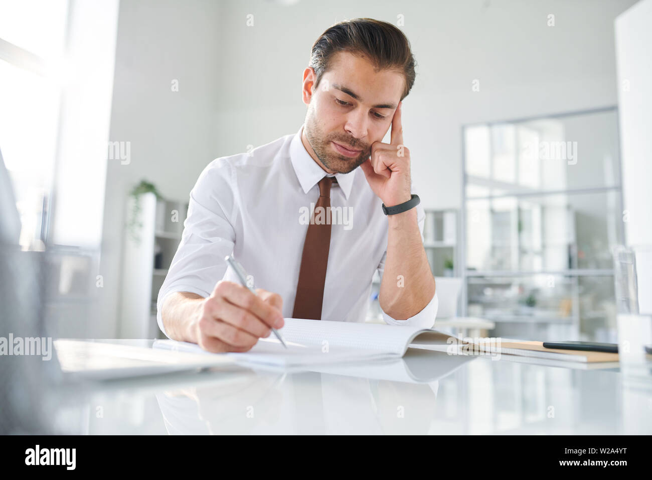 Pensive young man study hi-res stock photography and images - Alamy