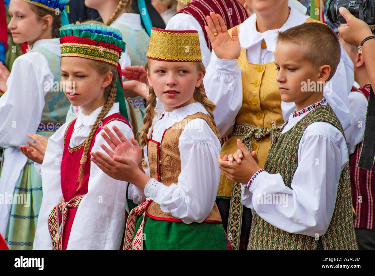 Vilnius / Lithuania - July 6 2019: Beautiful Lithuanian children dressing traditional  folk costumes during a national ceremony Stock Photo - Alamy