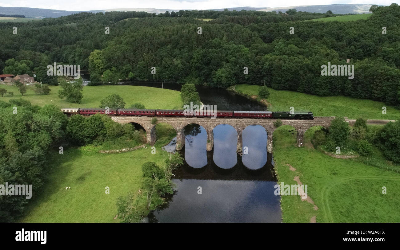 The Flying Scotsman passes over the Eden Lacy Viaduct over the River Eden near Little Salkeld in