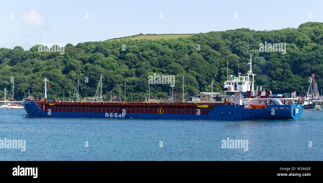 Cargo ship Pilsum from St Johns moves up the Fowey river in Cornwall, England to the China Clay works upsteam of Fowey Town Stock Photo