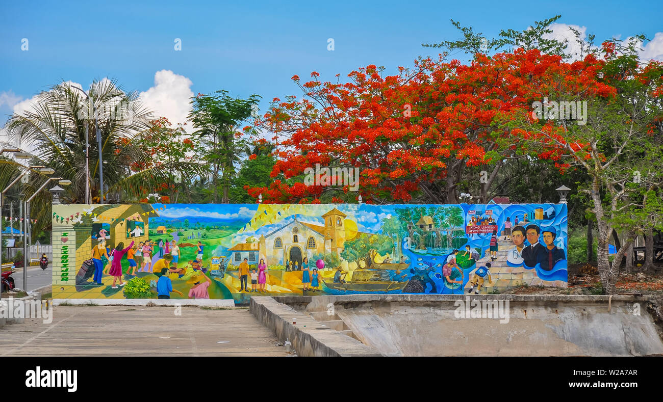 Giant mural welcomes tourists to Siquijor Island - Siquijor, Philippines Stock Photo