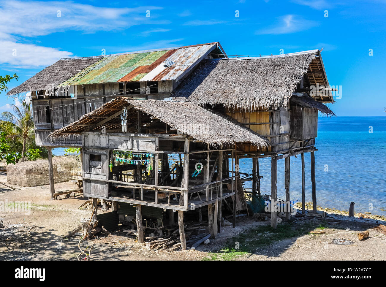 Old, almost dilapidated house made of native building materials - Siquijor Island, Philippines Stock Photo