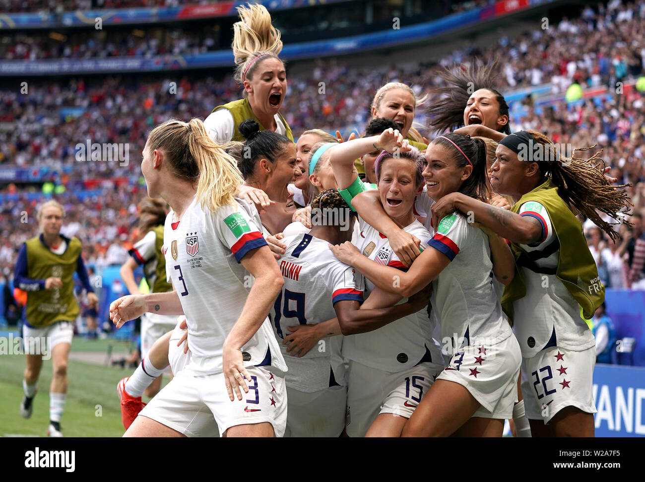 Annalee Rippe USA's Megan Rapinoe (centre) celebrates scoring her side's first goal ...