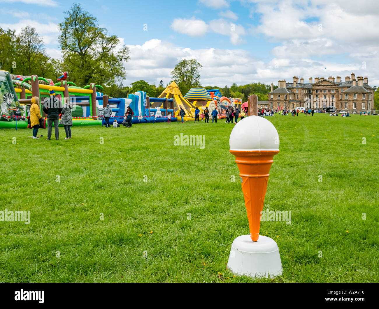 Labyrinth Challenge, Dalkeith Country Park, Midlothian, Scotland, UK.  Ice cream cone at world's longest inflatable obstacle course is over 1000ft in length Stock Photo