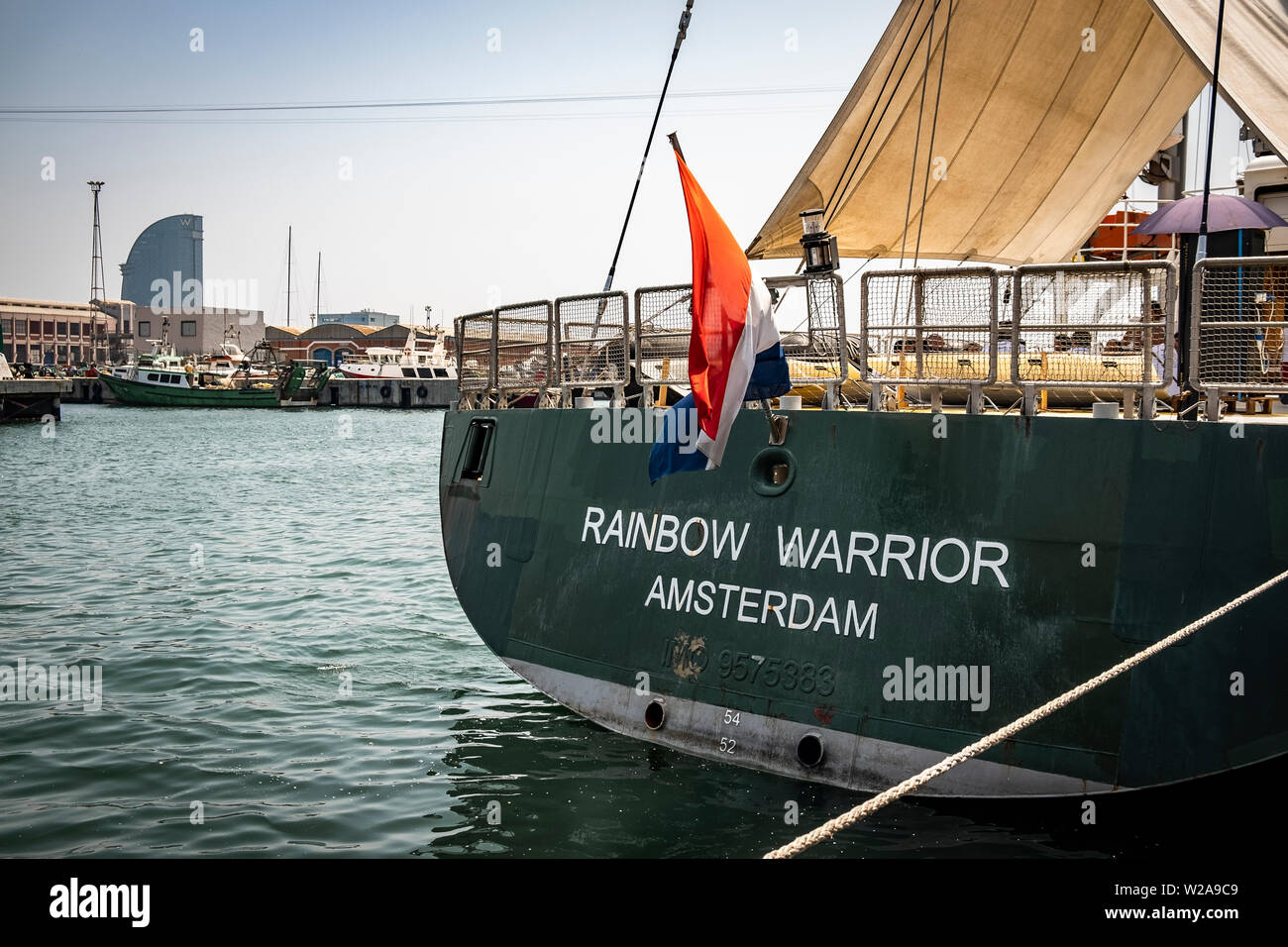 The stern of the Rainbow Warrior is seen at the port of Barcelona.The flagship Rainbow Warrior of Greenpeace arrives in Spain to fight against the climate crisis. The sailboat will stop at the ports of Barcelona, Malaga and Vigo to demand urgent measures against the climate crisis. Stock Photo