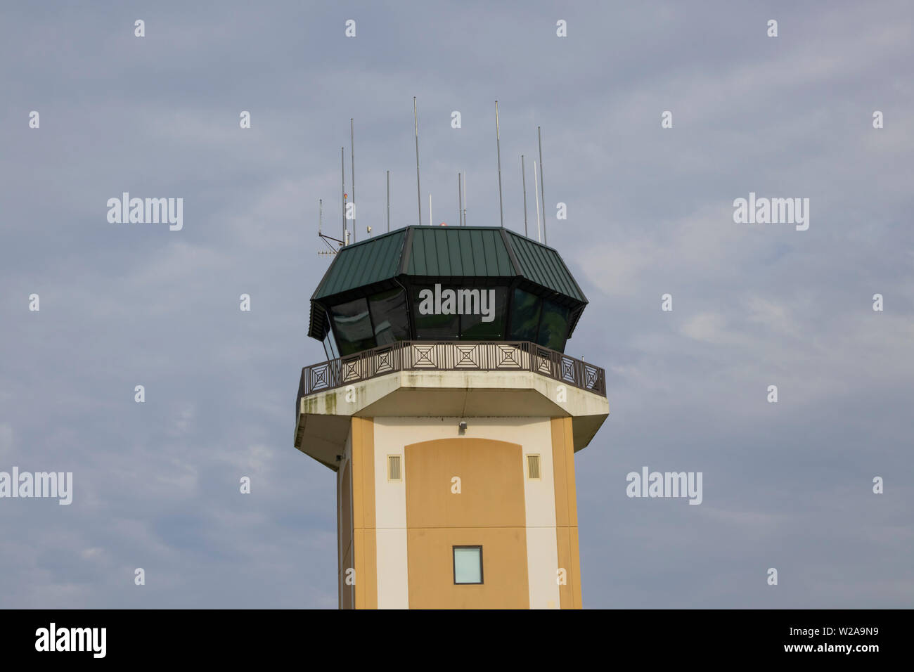An air traffic control tower at an airport Stock Photo