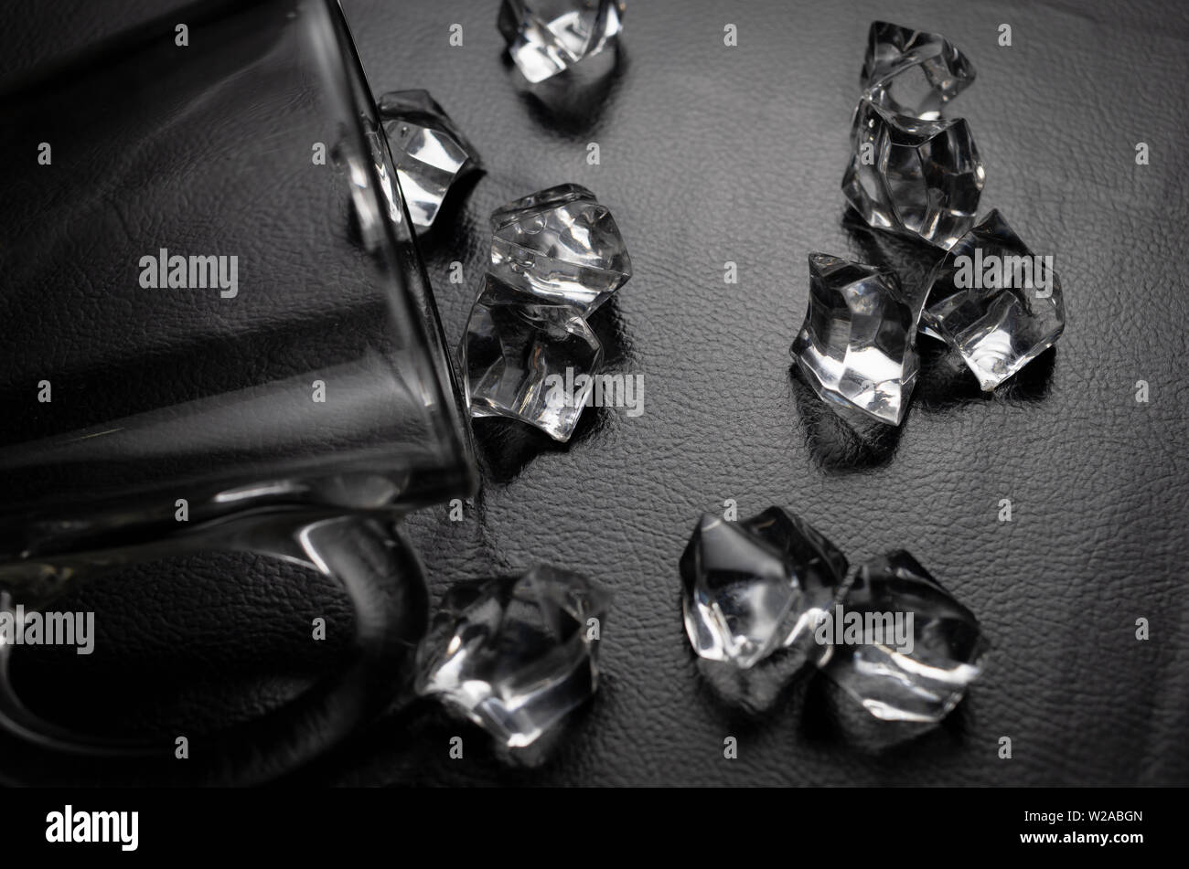 Crystals on the black leather Stock Photo