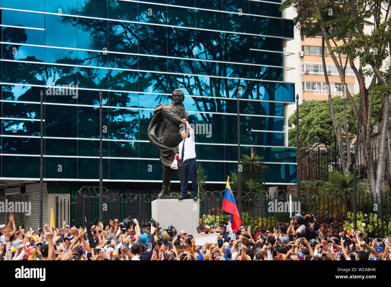 Juan Guiadó gives a speech during a protest against torture and repression made it by the security forces under the control of Nicolás Maduro. Stock Photo
