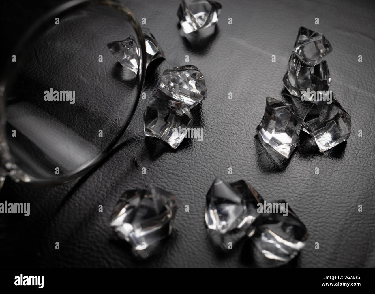 Crystals on the black leather Stock Photo