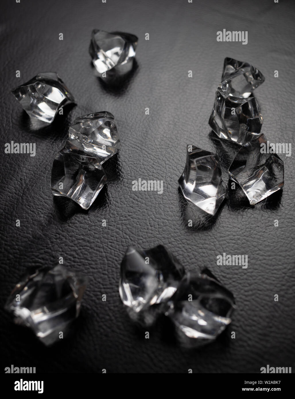 Crystals on the black leather Stock Photo