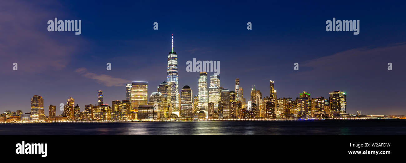 New York city Lower Manhattan skyline cityscape at dusk from New Jersey ...