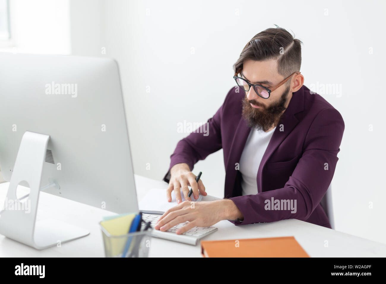 people, design and style concept - graphic designer sketching new ...