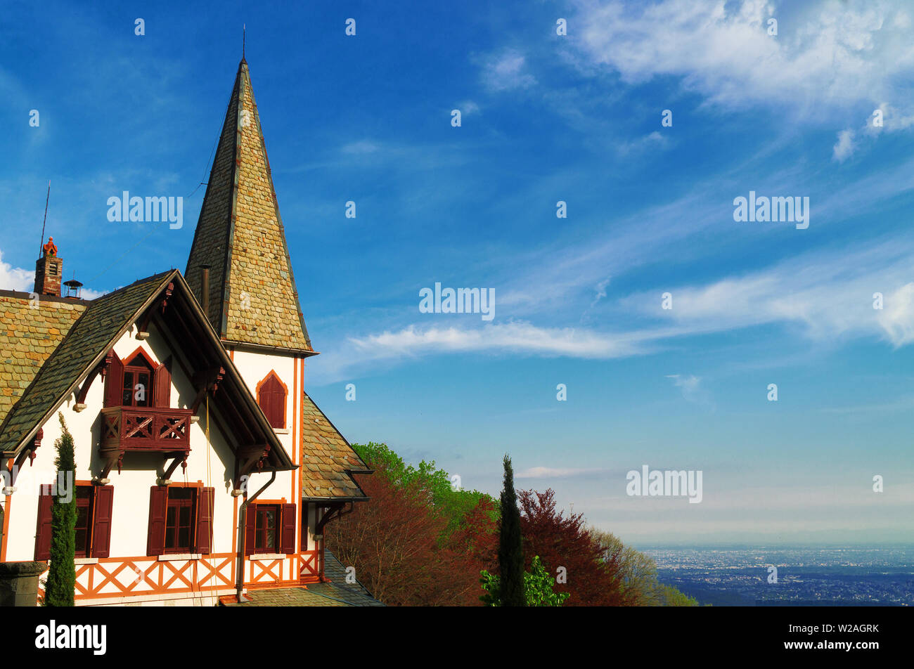 A Swiss-style house in the Alpine mountains. Stock Photo