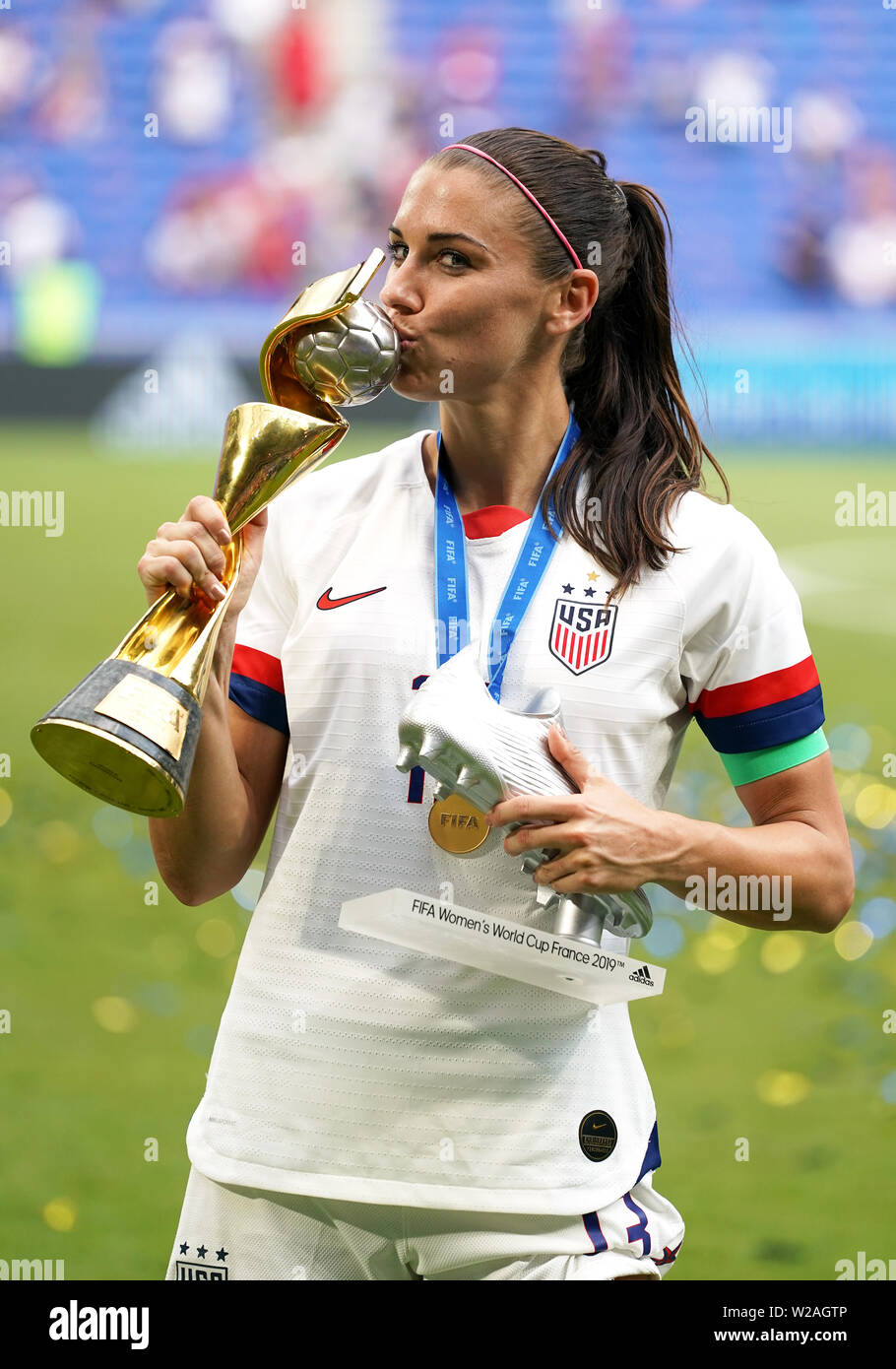 USA's Alex Morgan celebrates with the FIFA Women's World Cup Trophy and  adidas Silver Boot award after the final whistle after the FIFA Women's  World Cup 2019 Final at the Stade de