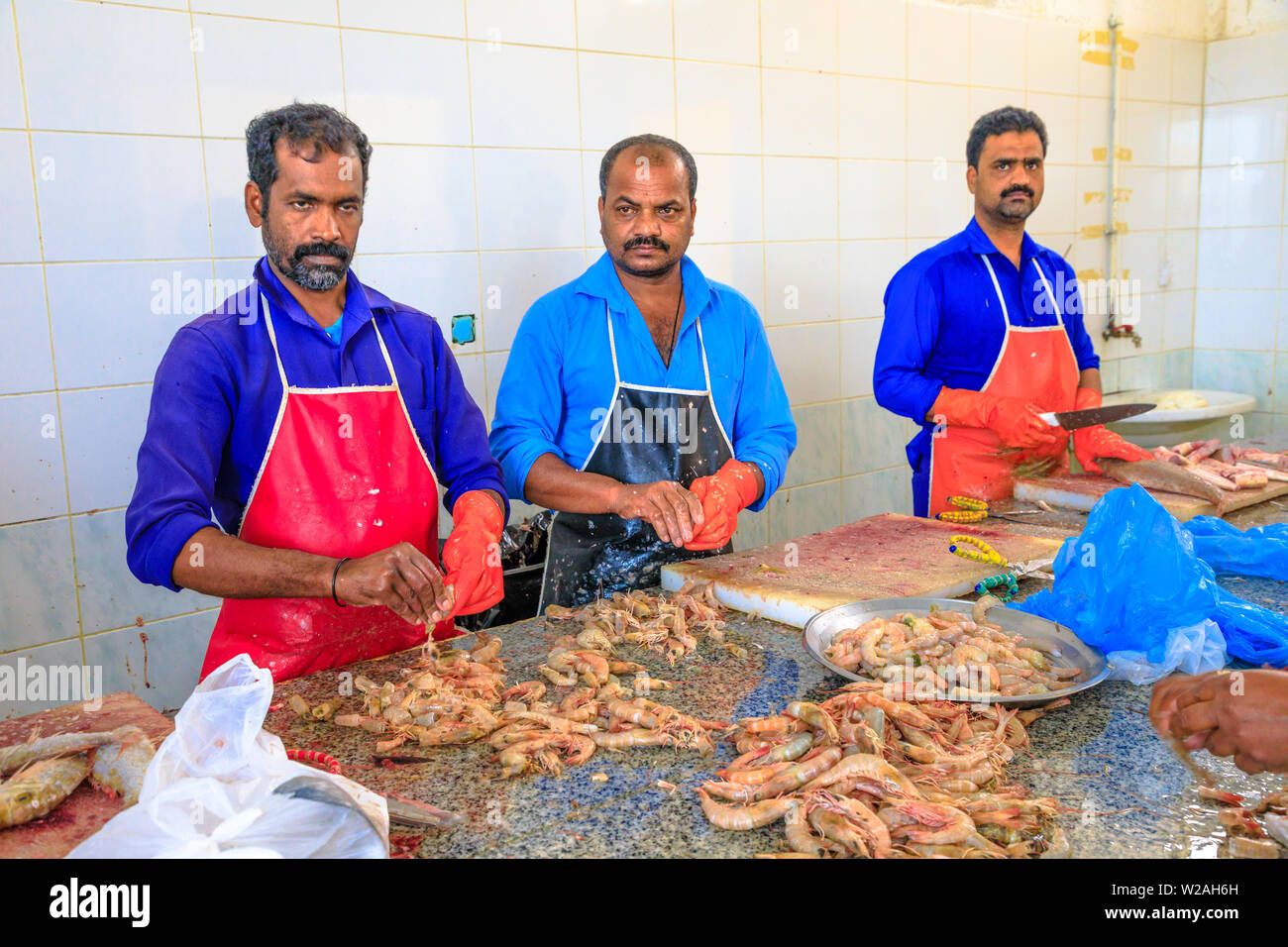 Al Khor, Qatar February 23, 2019 group of workers cleans and fresh