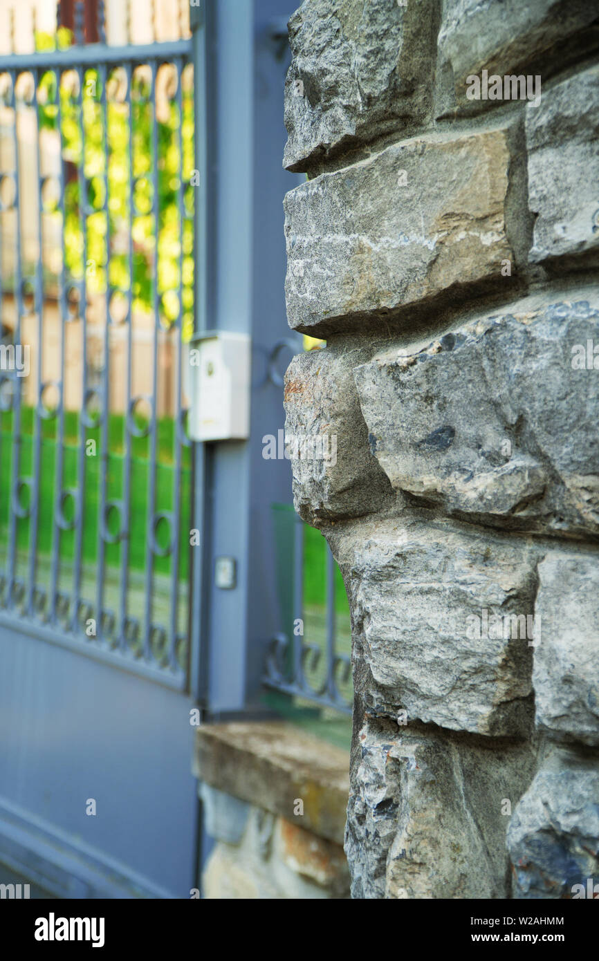 Metal gates and security camera. Concept of private property. Stock Photo