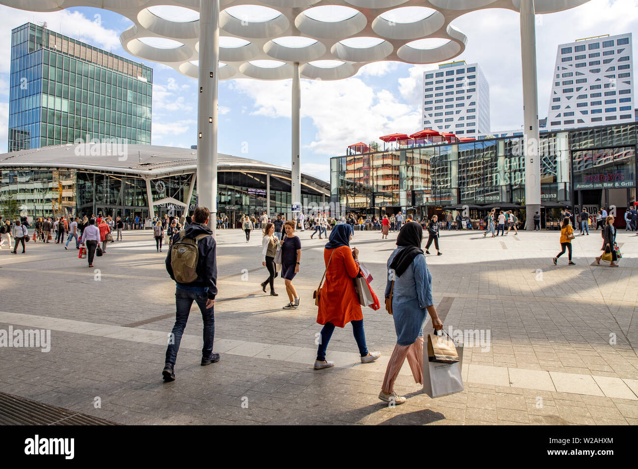 Utrecht, the Netherlands, station forecourt, Stationsplein, with a distinctive honeycomb canopy at Utrecht Centraal, Central Station, and the Hoog Cat Stock Photo