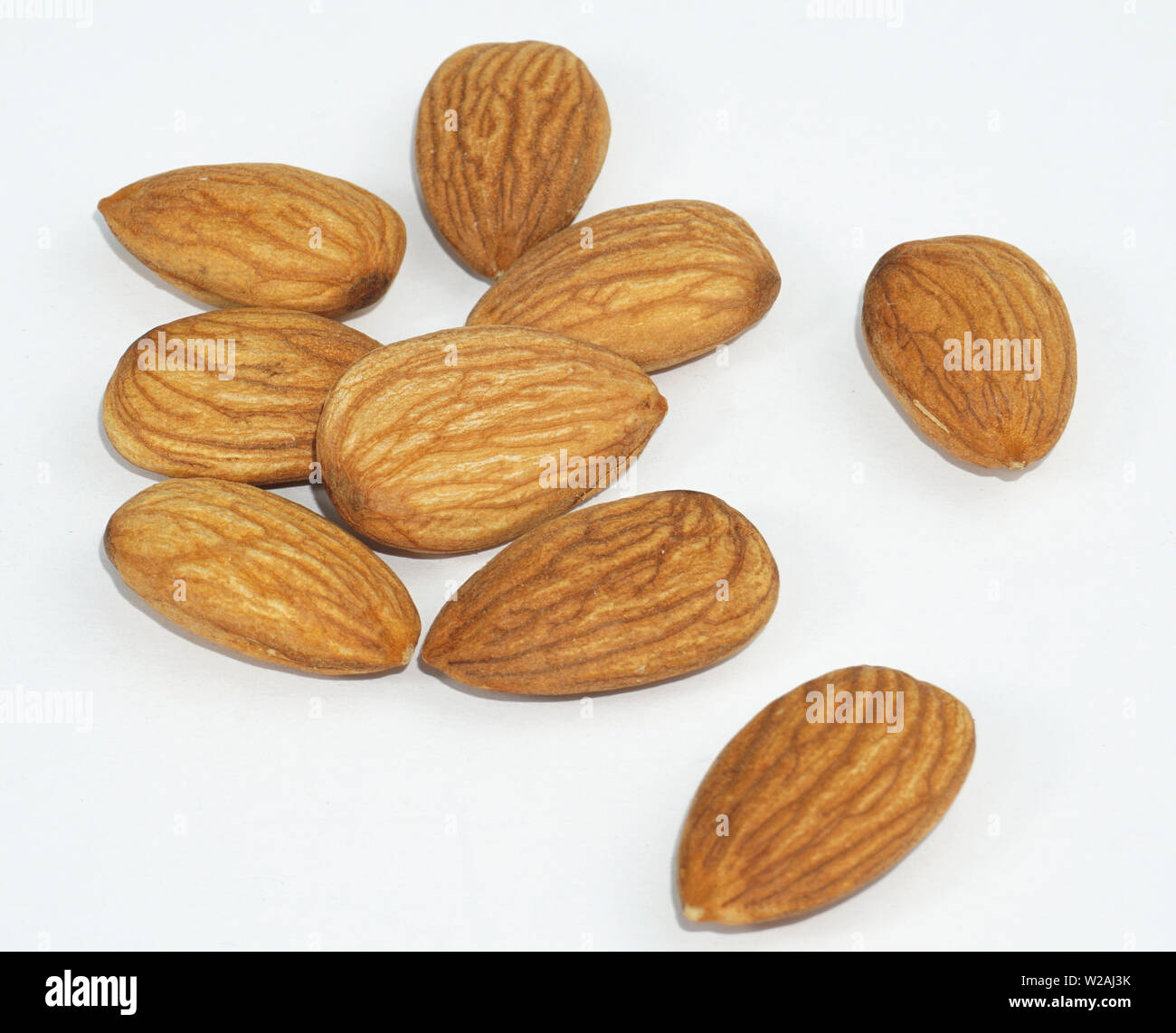 good and bad almonds isolated on white background Stock Photo Alamy