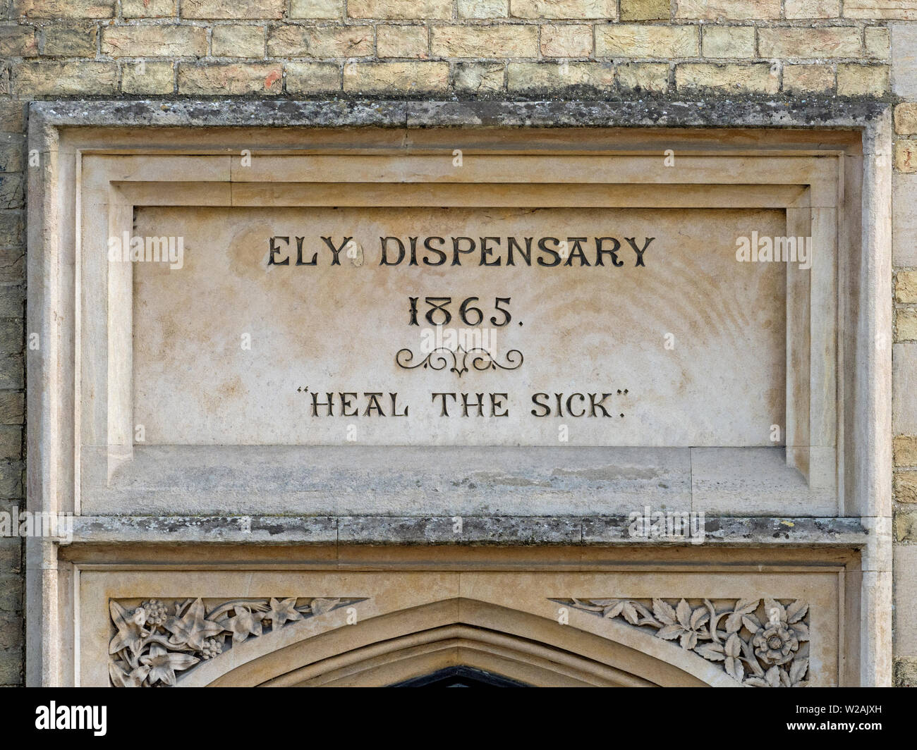 Ely dispensary plaque, dated 1865, Ely, Cambridgeshire, UK Stock Photo