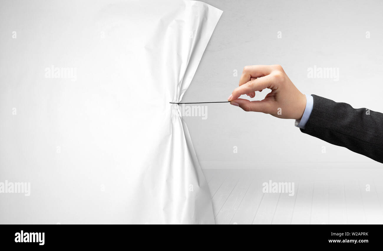 hand pulling white paper curtain, changing scene concept Stock Photo ...