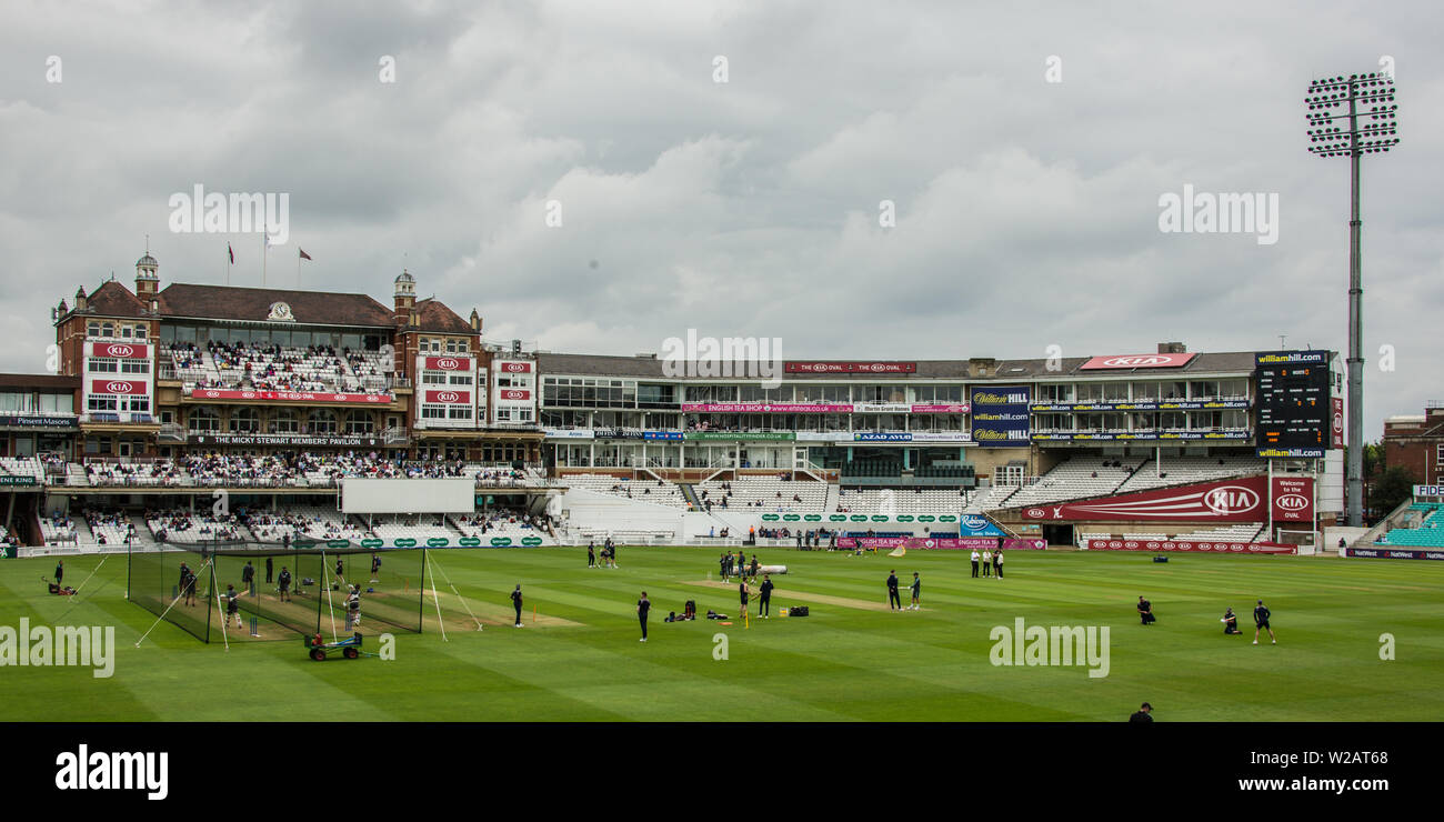 London, UK. 7 July, 2019. The players warm up infront of the Micky Stewart Members' Pavilion ahead of the first day of the Specsavers County Championship game between Surrey and Kent at the Kia Oval. David Rowe/Alamy Live News Stock Photo