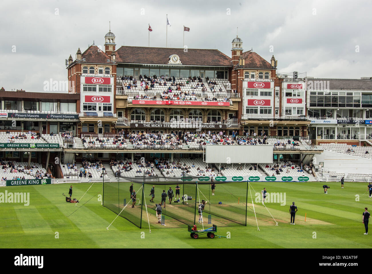 London, UK. 7 July, 2019. The players warm up infront of the Micky Stewart Members' Pavilion ahead of the first day of the Specsavers County Championship game between Surrey and Kent at the Kia Oval. David Rowe/Alamy Live News Stock Photo