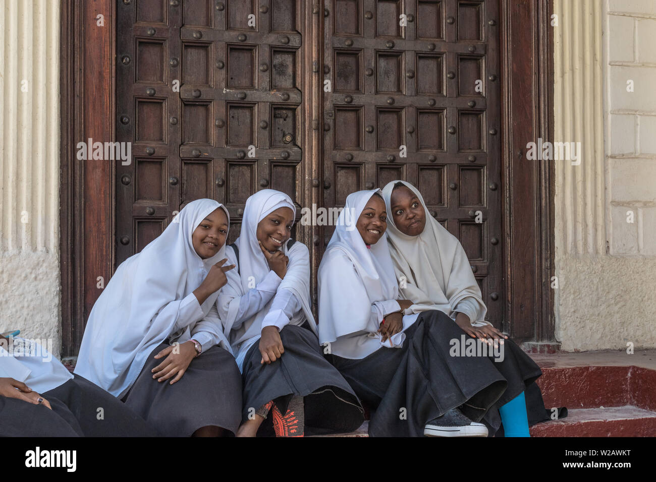 Young Muslim girls playfully posing for a picture. Stock Photo