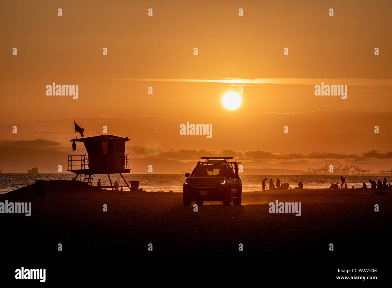 sunset at the beach in Huntington Beach, California Stock Photo
