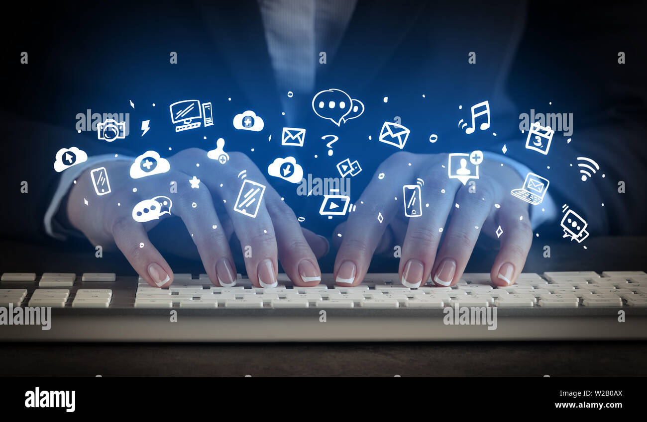 Blogger woman typing on keyboard with drawn application icons around ...