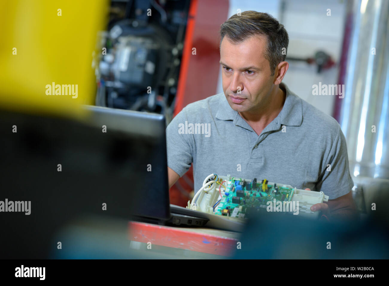 Child testing robot hi-res stock photography and images - Alamy
