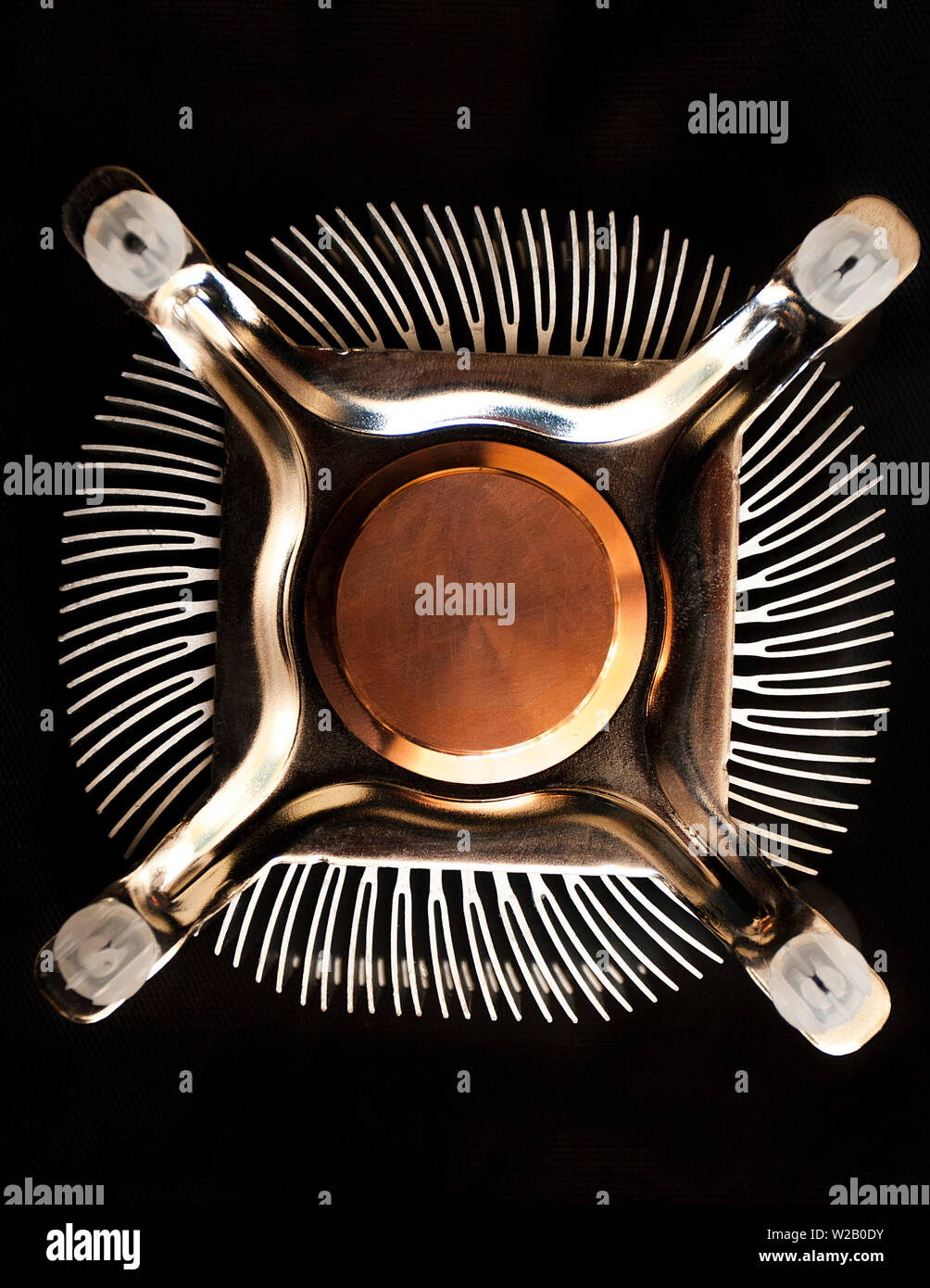 A copper heatsink, mounting brackets and the radiator fins of a CPU