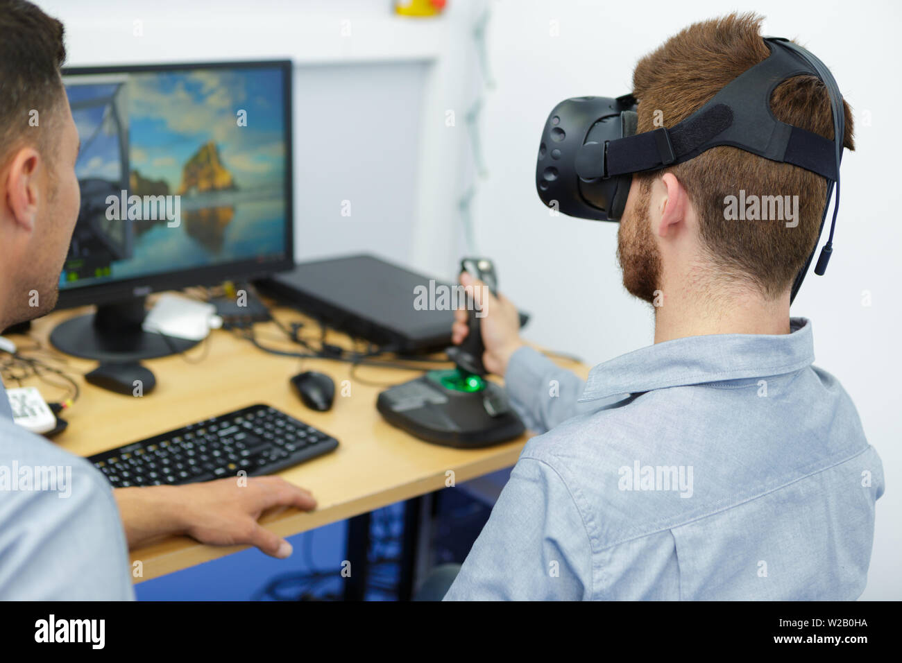 young man wearing virtual reality headset Stock Photo