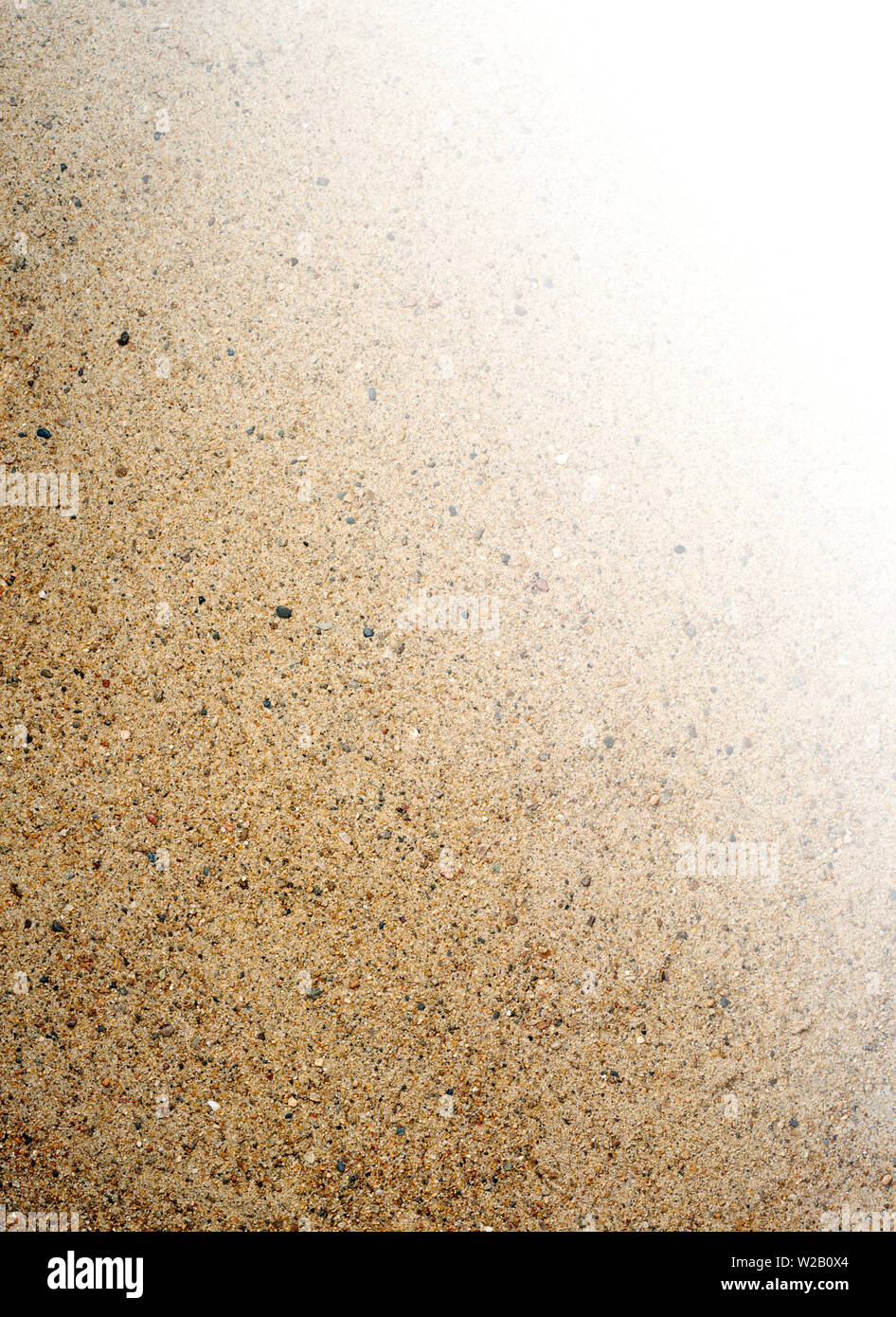 Overhead Macro Closeup Of Natural Tan Color Beach Sand Background Texture With Vignette To White Vertical Stock Photo Alamy