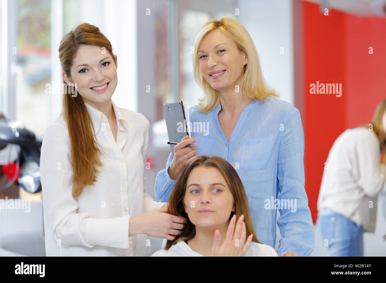 learning the job of a hairdresser Stock Photo Alamy