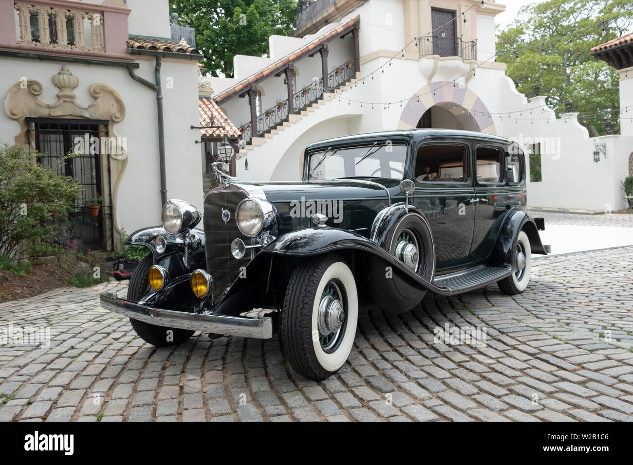 A 1932 Cadillac parked in the courtyard of the Vanderbilt Mansion in Centerport, Long Island, New York Stock Photo