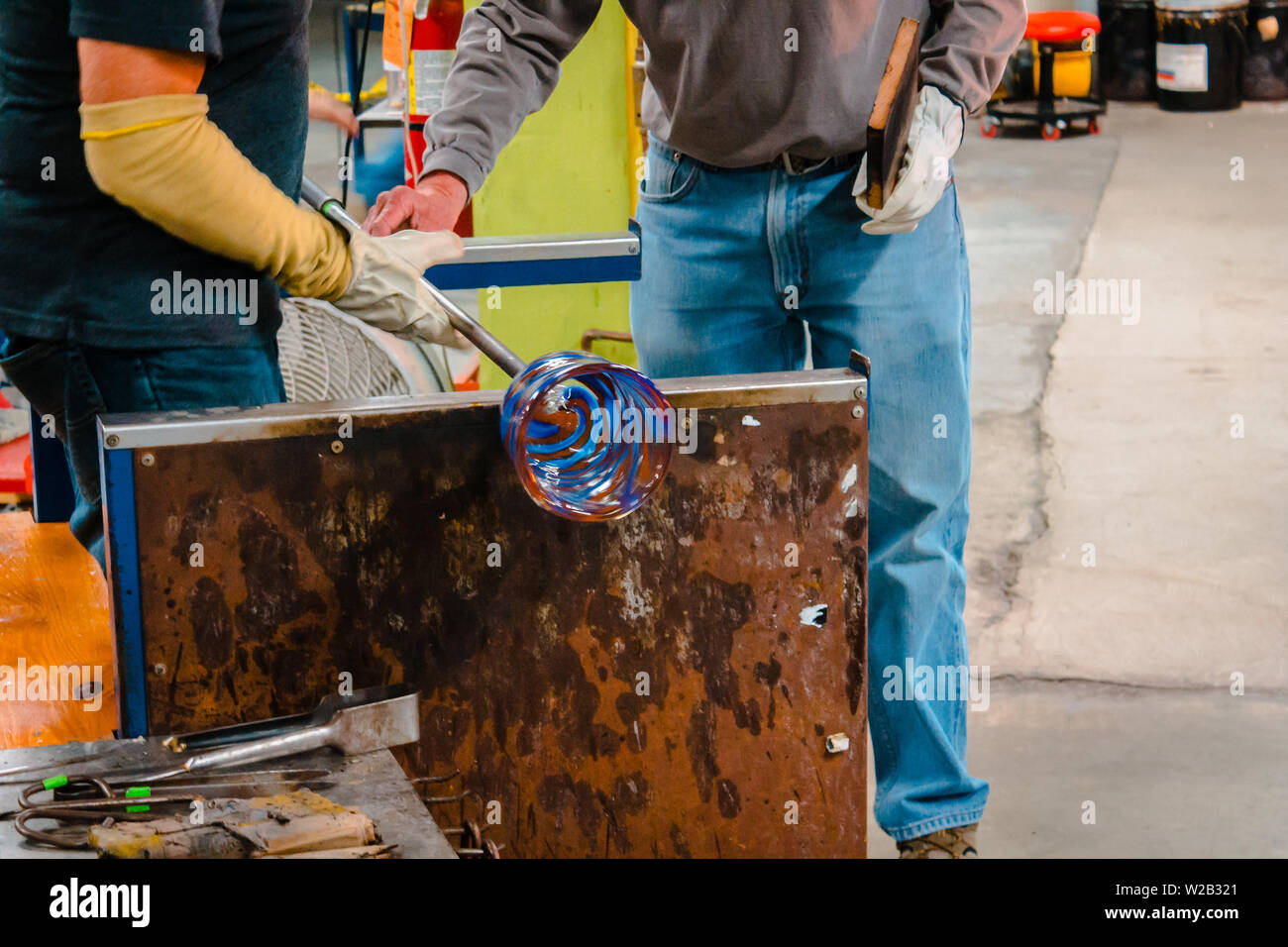 Spinning out the glass to shape it into a bowl Stock Photo Alamy
