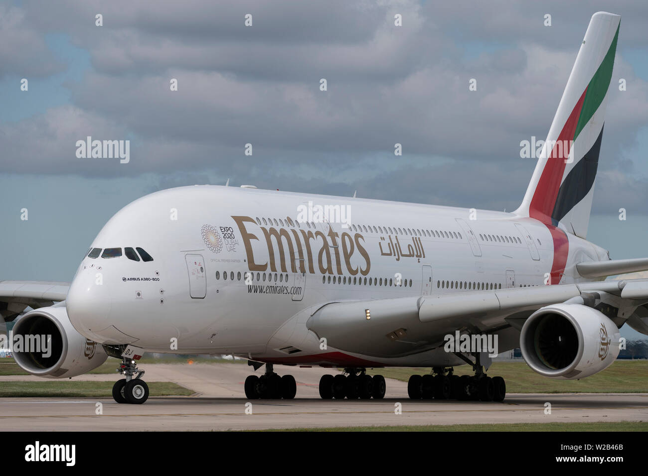 An Emirates Airbus A380-861 taxis on the runway at Manchester Airport, UK. Stock Photo