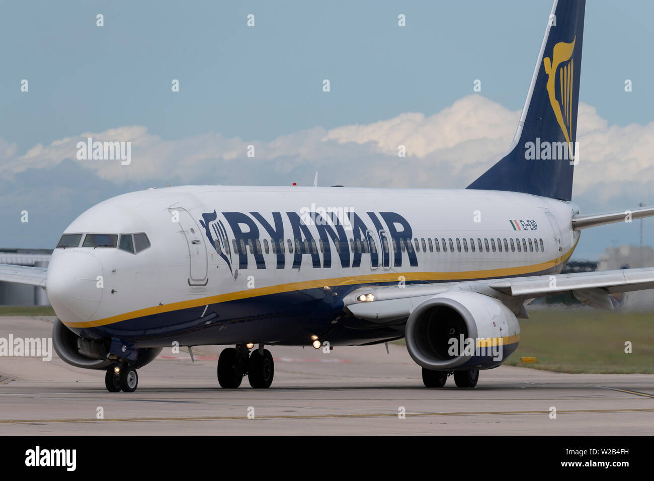 A Ryanair Boeing 737-800 taxis on the runway at Manchester Airport, UK. Stock Photo