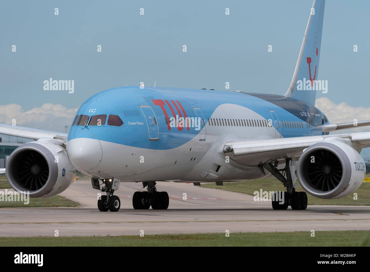 A TUI Boeing 757-200 taxis on the runway at Manchester Airport, UK. Stock Photo