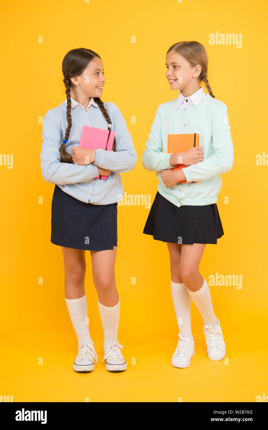 Knowledge day. Schoolgirls best friends excellent pupils. Secondary