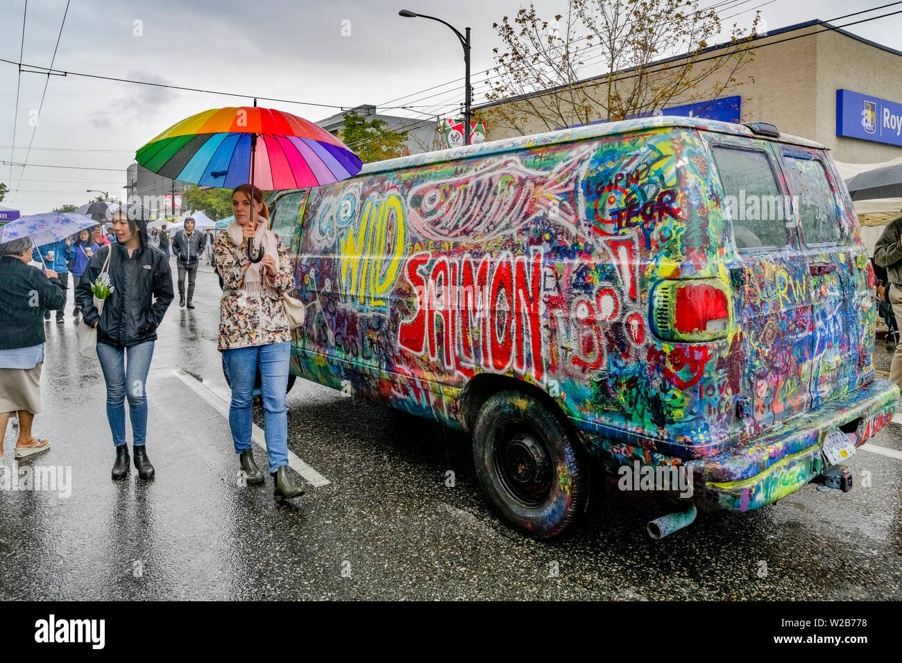 Wildly painted Hippie style van, Car Free Day, Commercial Drive, Vancouver, British Columbia, Canada Stock Photo