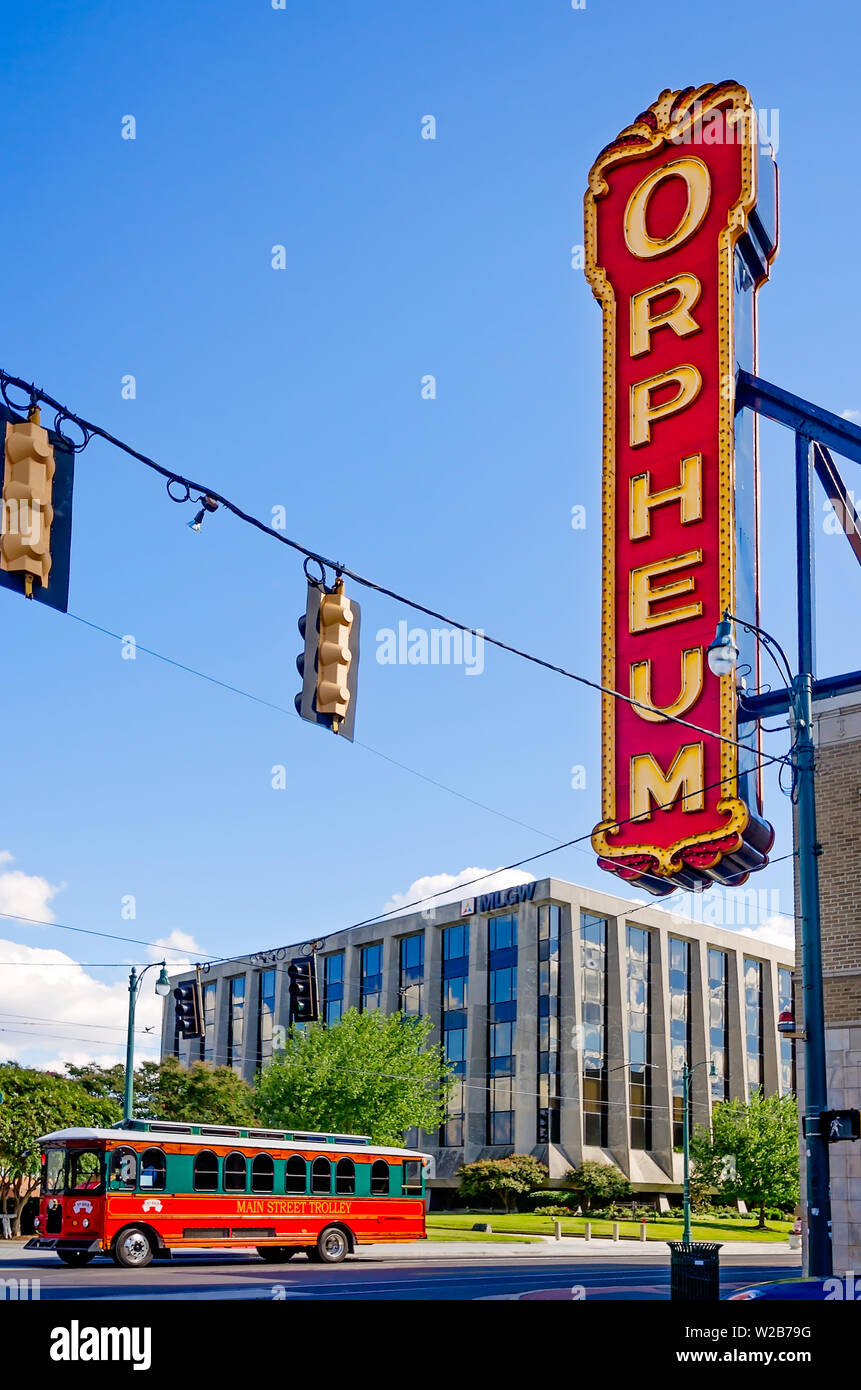 A trolley bus passes The Orpheum Theatre, Sept. 12, 2015, in Memphis, Tennessee. The theatre seats 2,038 people. Stock Photo