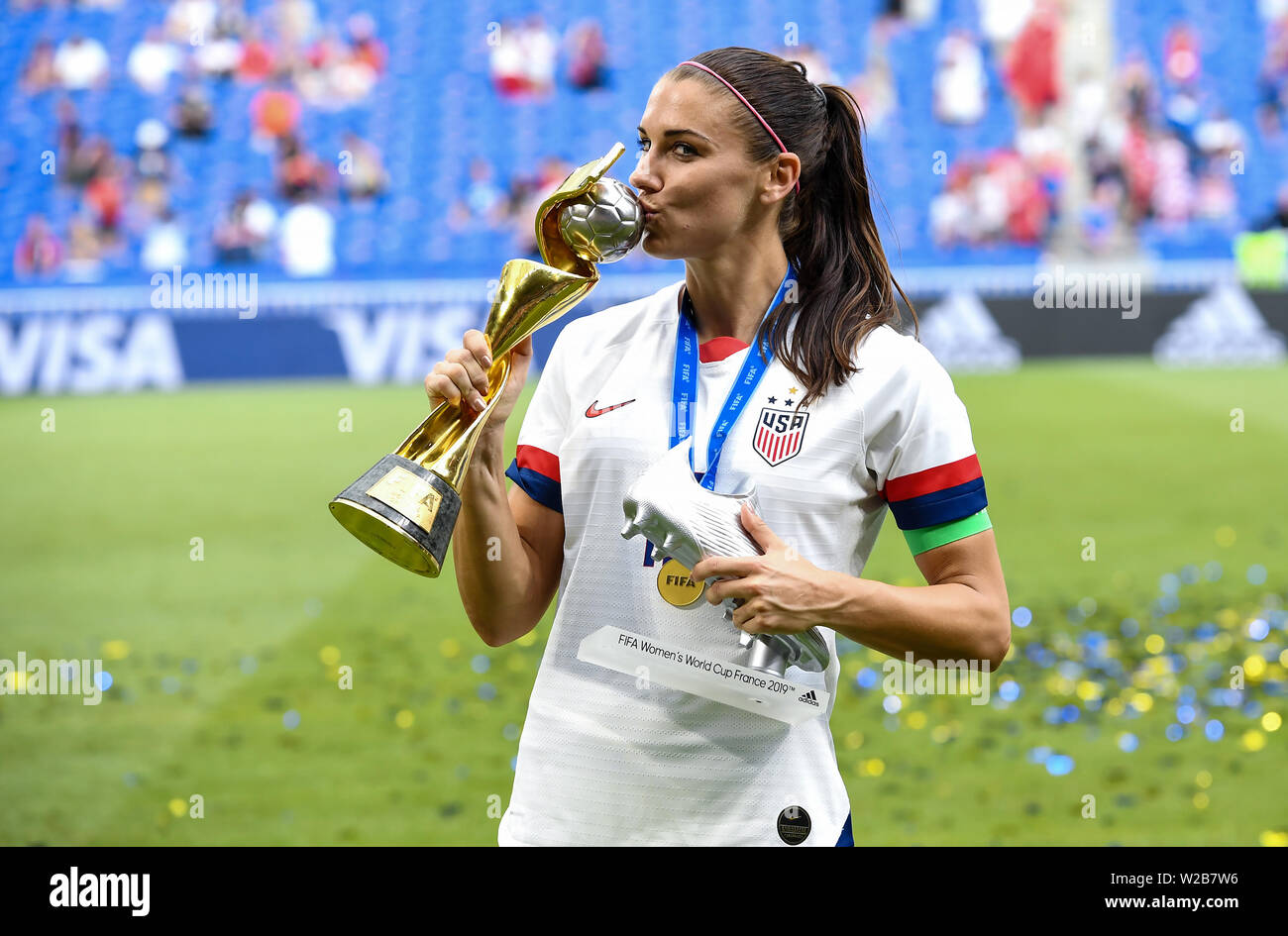Lyon, France. 7th July, 2019. Alex Morgan of the United States kisses the  World Cup champions trophy after the awarding ceremony of the 2019 FIFA Women's  World Cup Final at Stade de