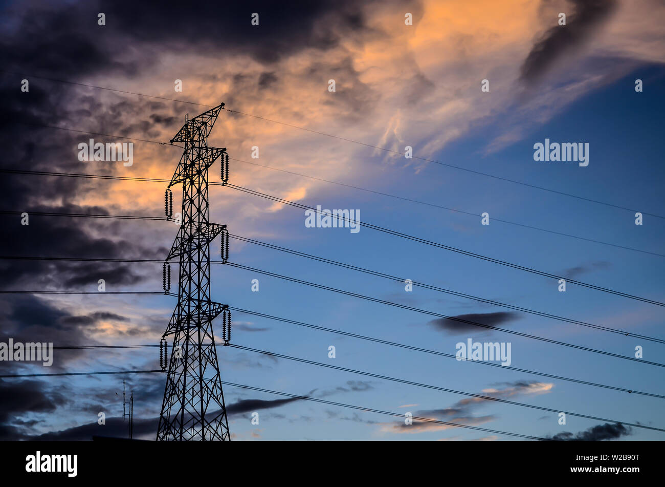 high voltage post at sunset Stock Photo
