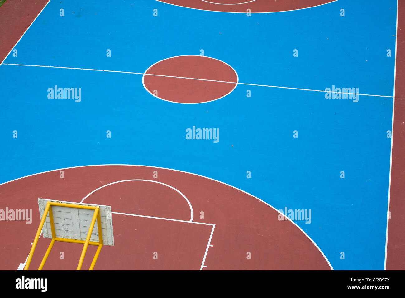 Colours of a basketball court in blue and red surface from aerial perspective Stock Photo